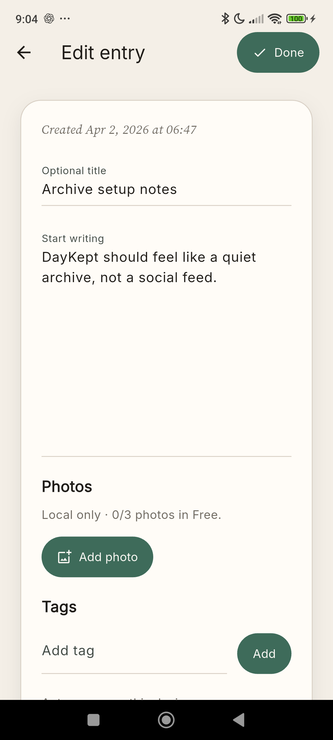 DayKept entry editor showing writing in progress, the Photos section and Add photo.